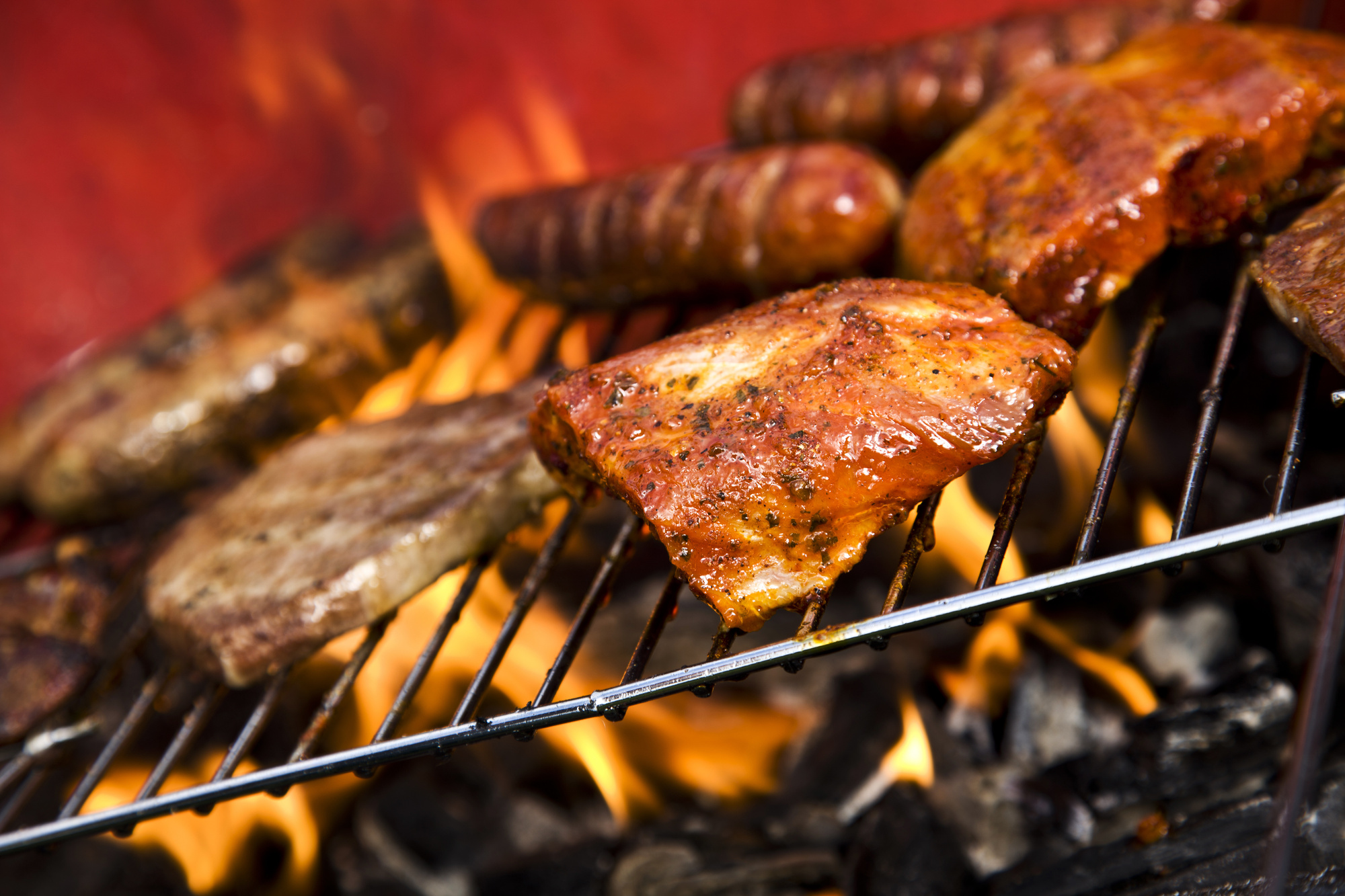 Juicy charcoal-grilled meat on open flame